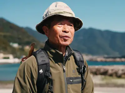 東 完治